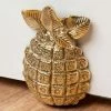 Signature Hardware Pineapple 5-1/2 in. Brass Wedge Door Stop in Polished Brass