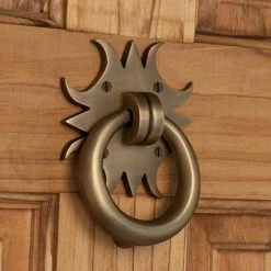 Signature Hardware Sun 3-3/4 in. Brass Door Knocker in Antique Brass