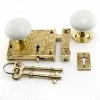 Signature Hardware Ornate Brass Privacy Rim Lock Set with Right Hand Knob in White with Polished Brass