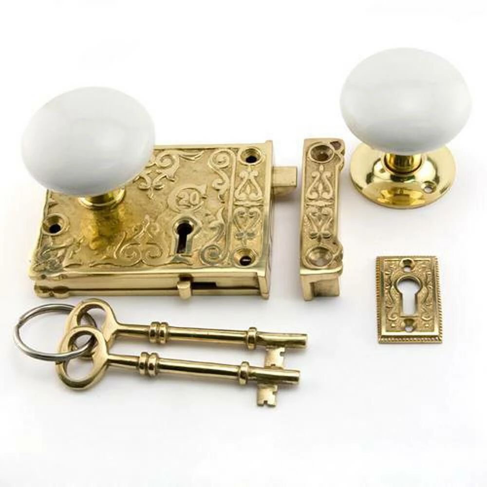 Signature Hardware Ornate Brass Privacy Rim Lock Set with Right Hand Knob in White with Polished Brass
