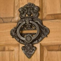 Signature Hardware Cherubs 7 in. Cast Iron Door Knocker in Beeswax Iron