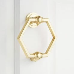 Signature Hardware Arcaro Brass Door Knocker in Polished Brass
