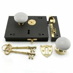 Signature Hardware Carpenter's Cast Iron Rim Lock Set with Porcelain Knobs Right Hand in Polished Brass