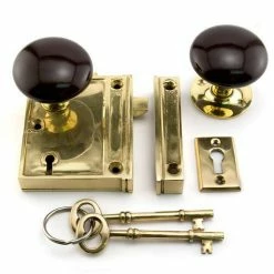 Signature Hardware Vertical Solid Brass Privacy Rim Lock Set with Right Hand Knob in Polished Brass