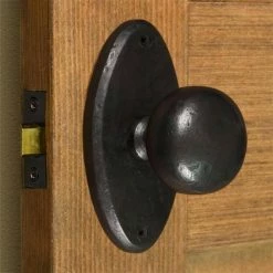 Signature Hardware Marwick Bronze Oval Passage Knob Set in Dark Bronze