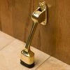 Signature Hardware 2 in. Brass Kickdown Door Stop in Polished Brass