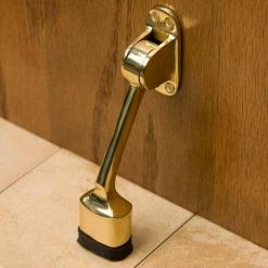 Signature Hardware 2 in. Brass Kickdown Door Stop in Polished Brass