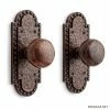 Signature Hardware Marconi 6-5/8 in. Brass Passage Door Set Knob 2-3/4 in. Backset in Antique Brass Passage