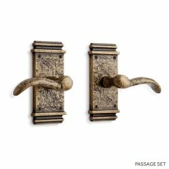 Signature Hardware Griggs Solid Brass Passage Door Set with Dual Lever Handle in Antique Brass