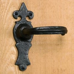 Signature Hardware Brass and Hand Forged Iron Fleur de Lis Passage Lever Set in Black Powder Coat