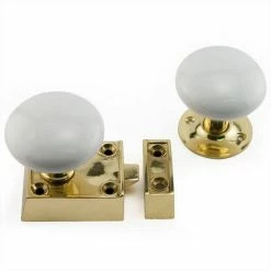 Signature Hardware Small Solid Brass Rim Lock Latch Set with Left Hand Knob in White with Polished Brass